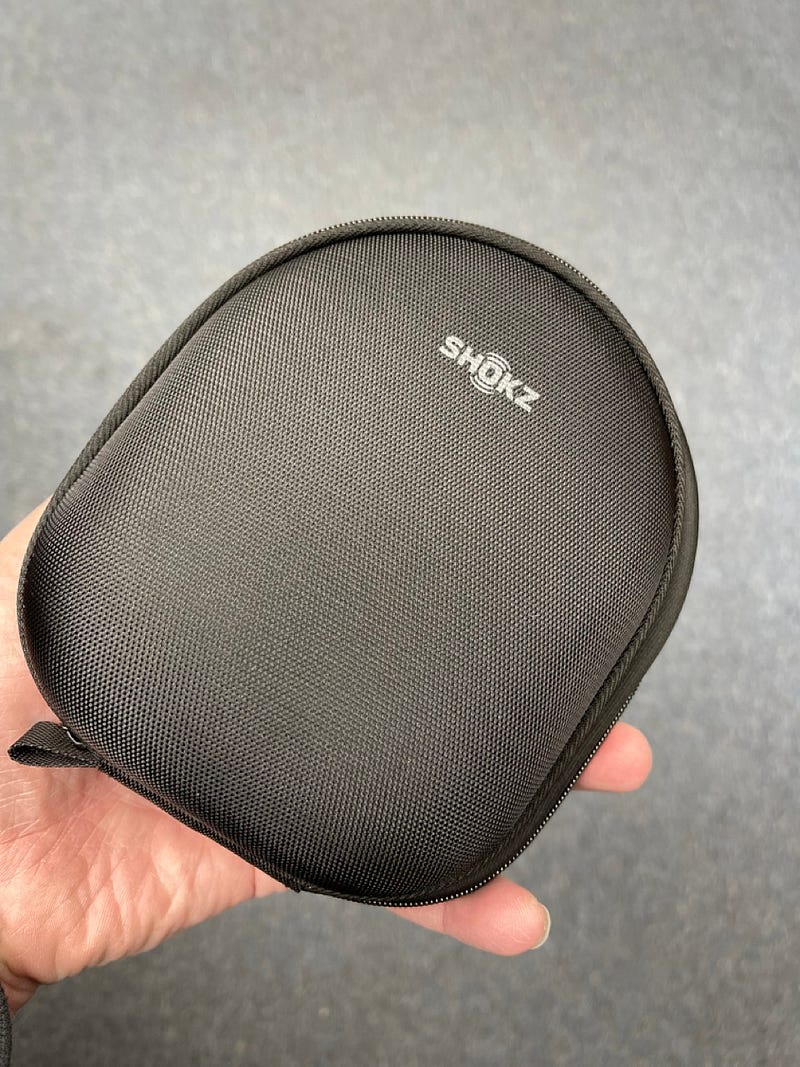 Closed case for headphone storage