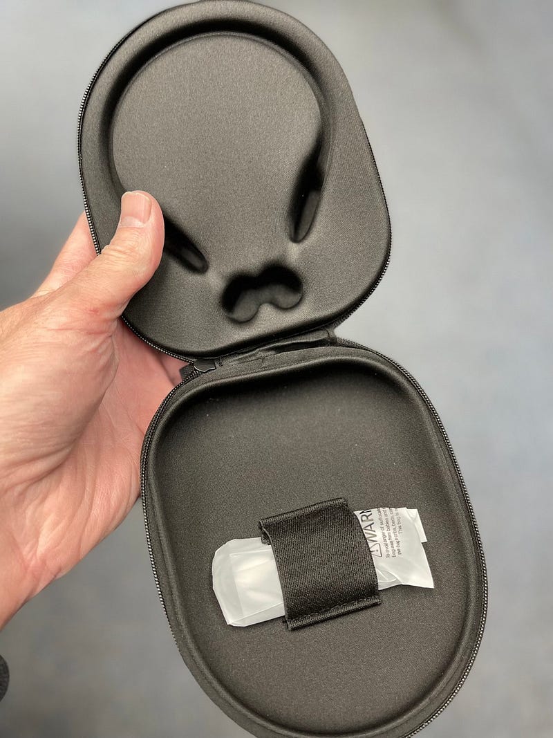 Open case showcasing headphone storage